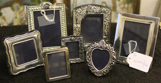 7 various embossed & plain silver small photograph frames
